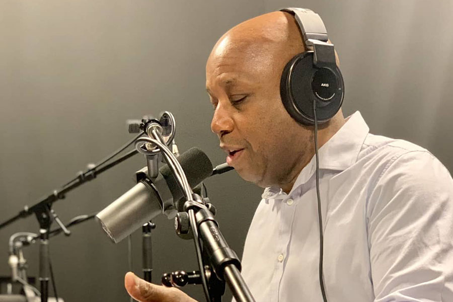 Errol Louis recording his podcast at NY1. 