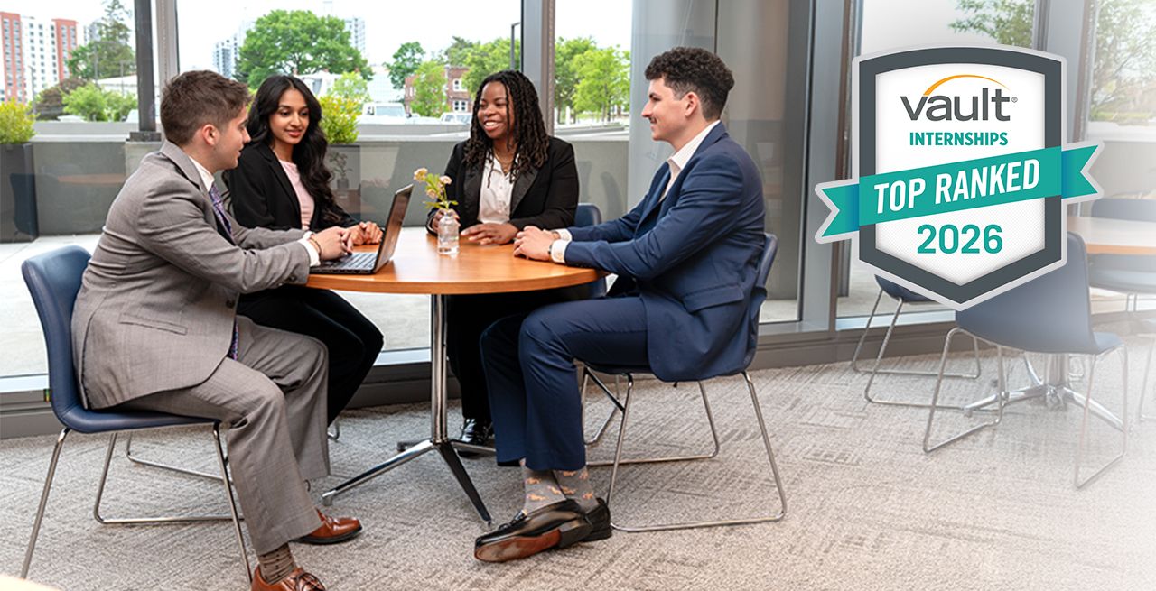 Student interns collaborating in a corporate setting