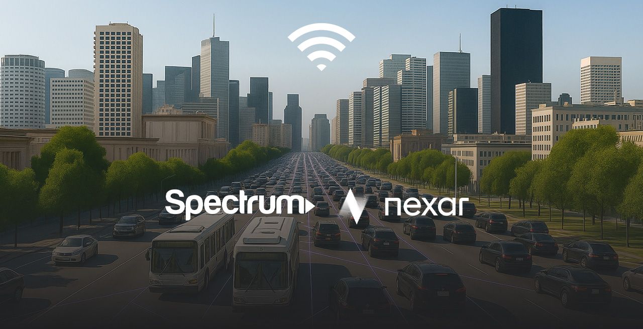 A highway and cityscape scene with Spectrum and Nexar logos and WiFi symbol