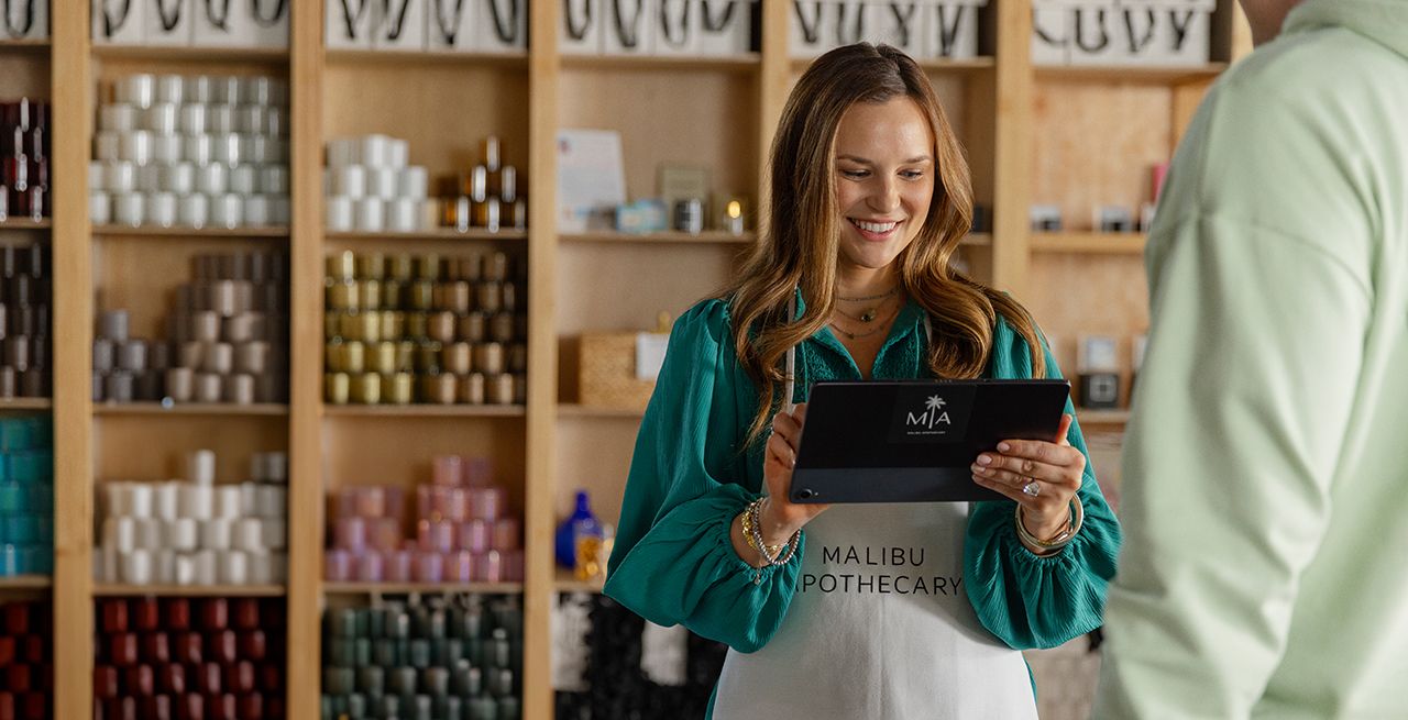 Malibu Apothecary owner working with customers