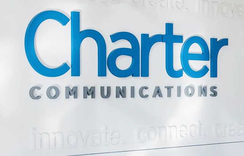 Charter logo on white wall