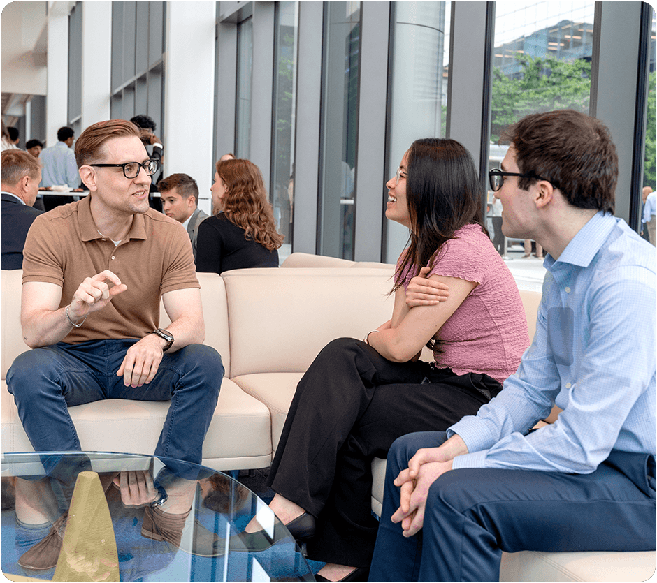 Spectrum Scholars sit and talk during an event