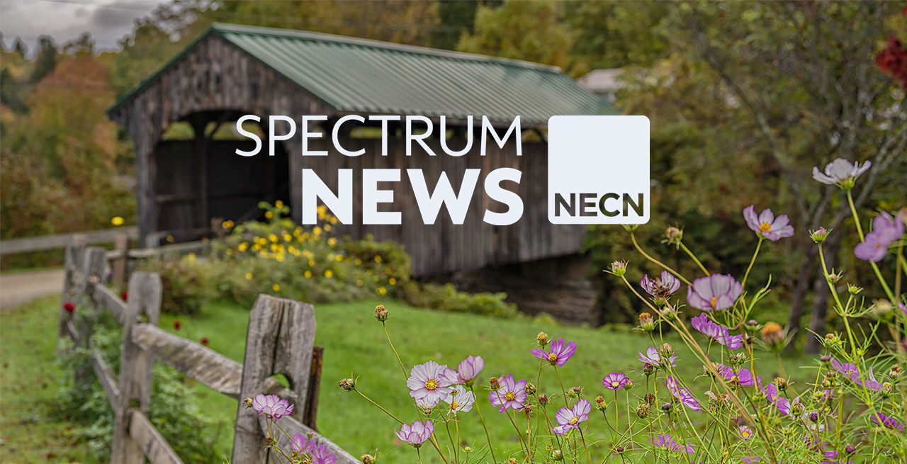 An old covered bridge with Spectrum News and NECN logo