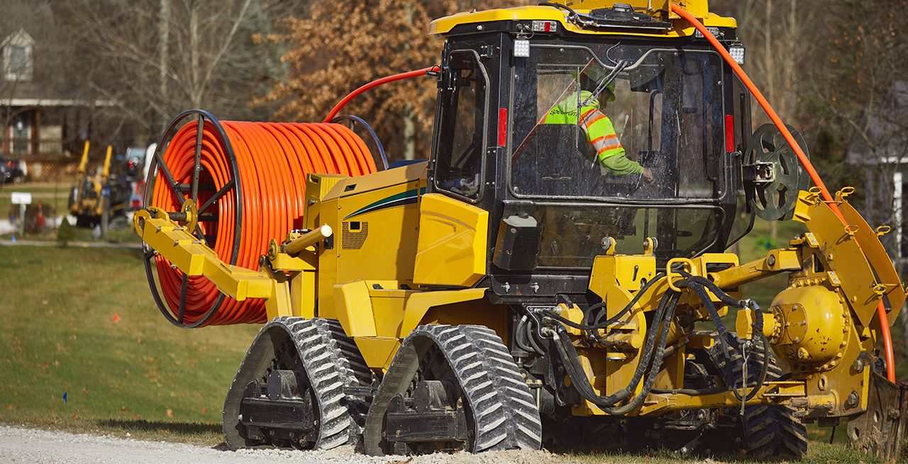 Spectrum technician crew working on broadband expansion project