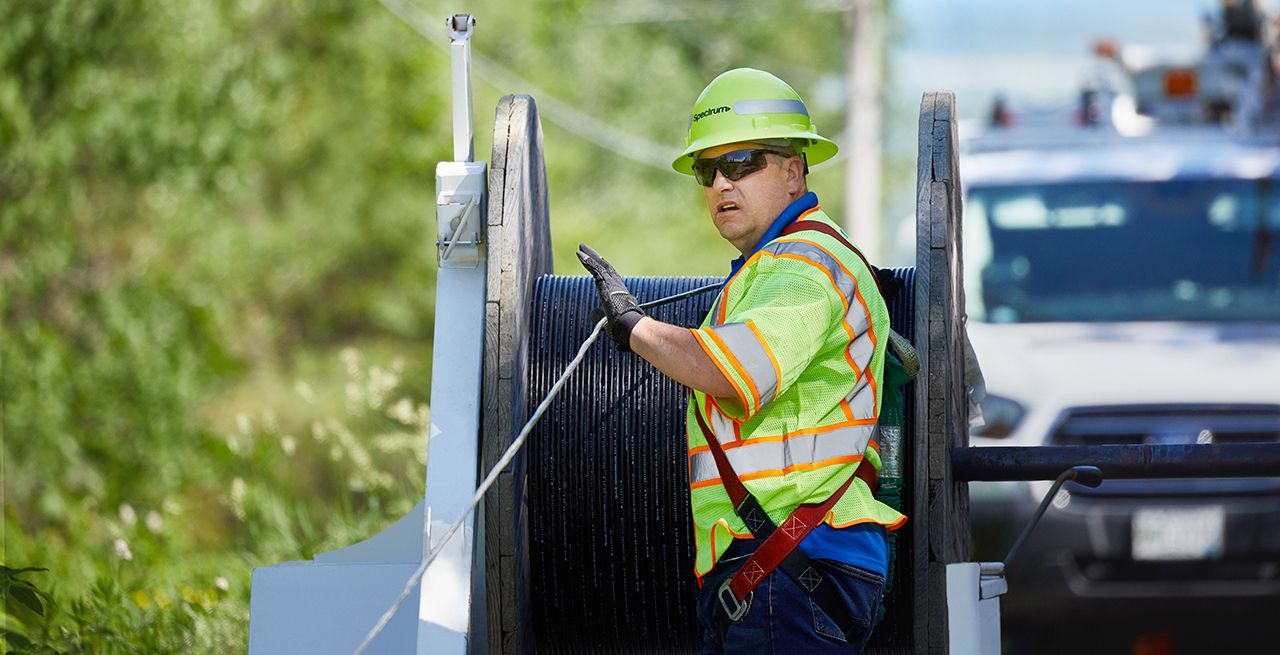 Spectrum technician crew working on a broadband expansion project