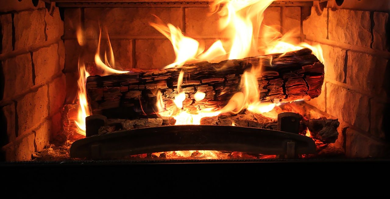 Holiday yule log burning in a fireplace