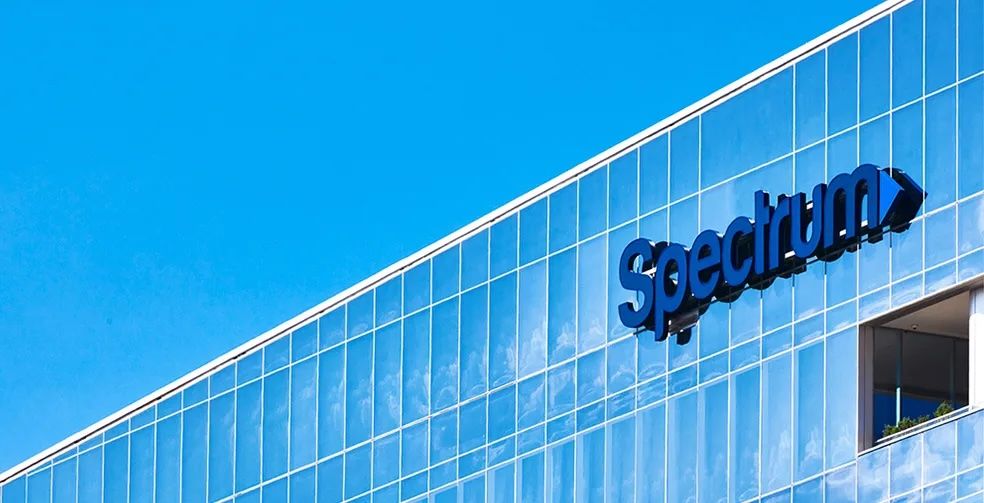 Spectrum logo on side of HQ building
