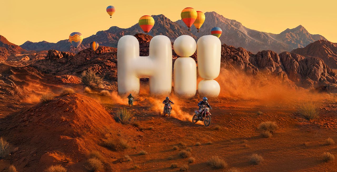 Large inflatable Hi! in mountain scene