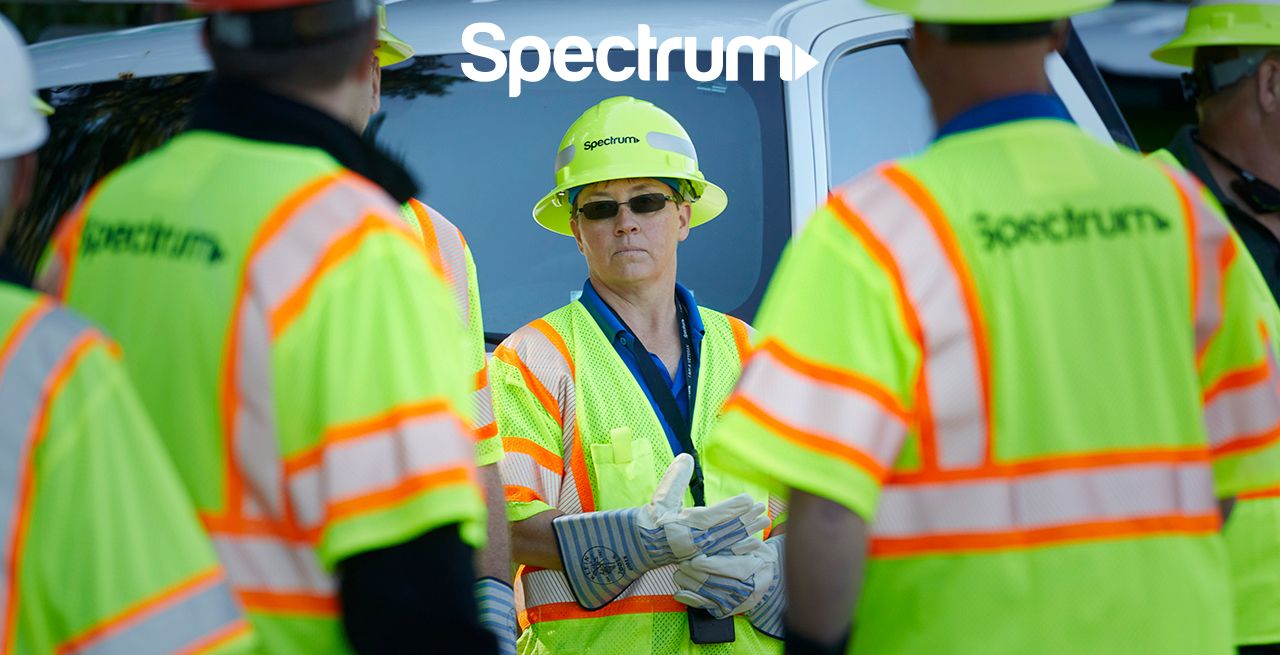 Spectrum technician crew working on broadband expansion project