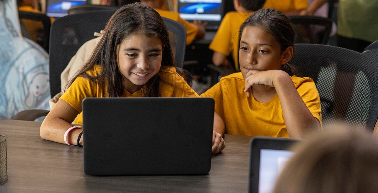 Children using a laptop at the Alu Like community center in Hawai'i