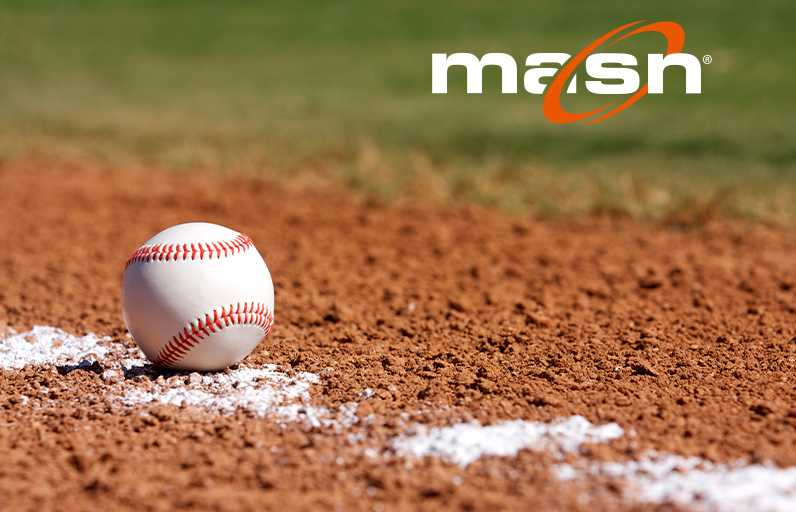 Baseball sitting on a foul line with MASN logo