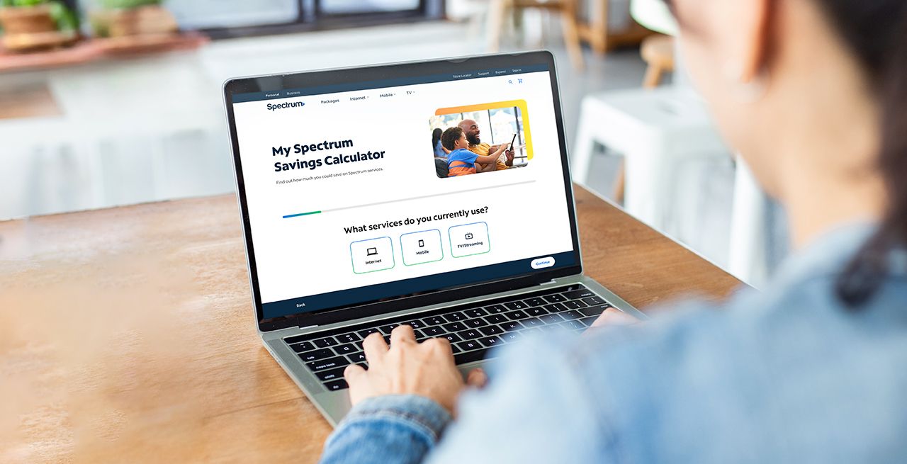 Spectrum Savings Calculator shown on a laptop